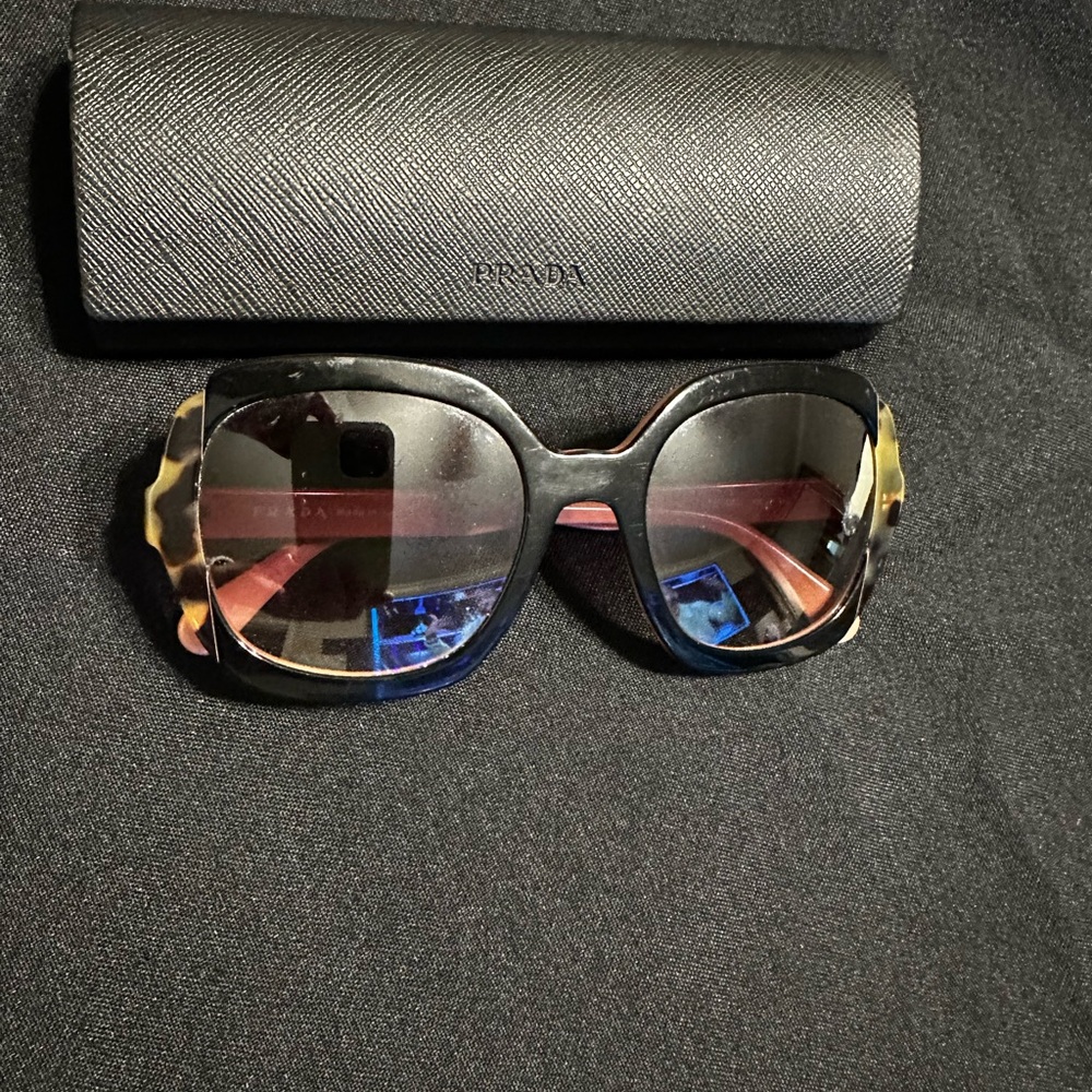 Prada Women's Sunglasses in Black with Gold Accents
